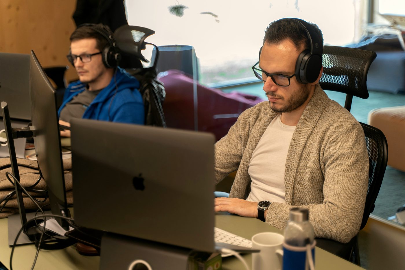A developer at his desk building a custom application, the kind of focused work a Buildline engagement runs on.